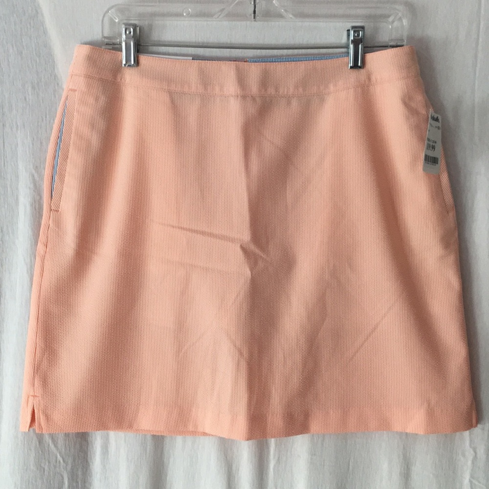 Orange Greg Norman golf skirt